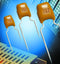 AVX SR215C103JAR CERAMIC CAPACITOR 0.01UF, 50V, X7R, 5%, RADIAL